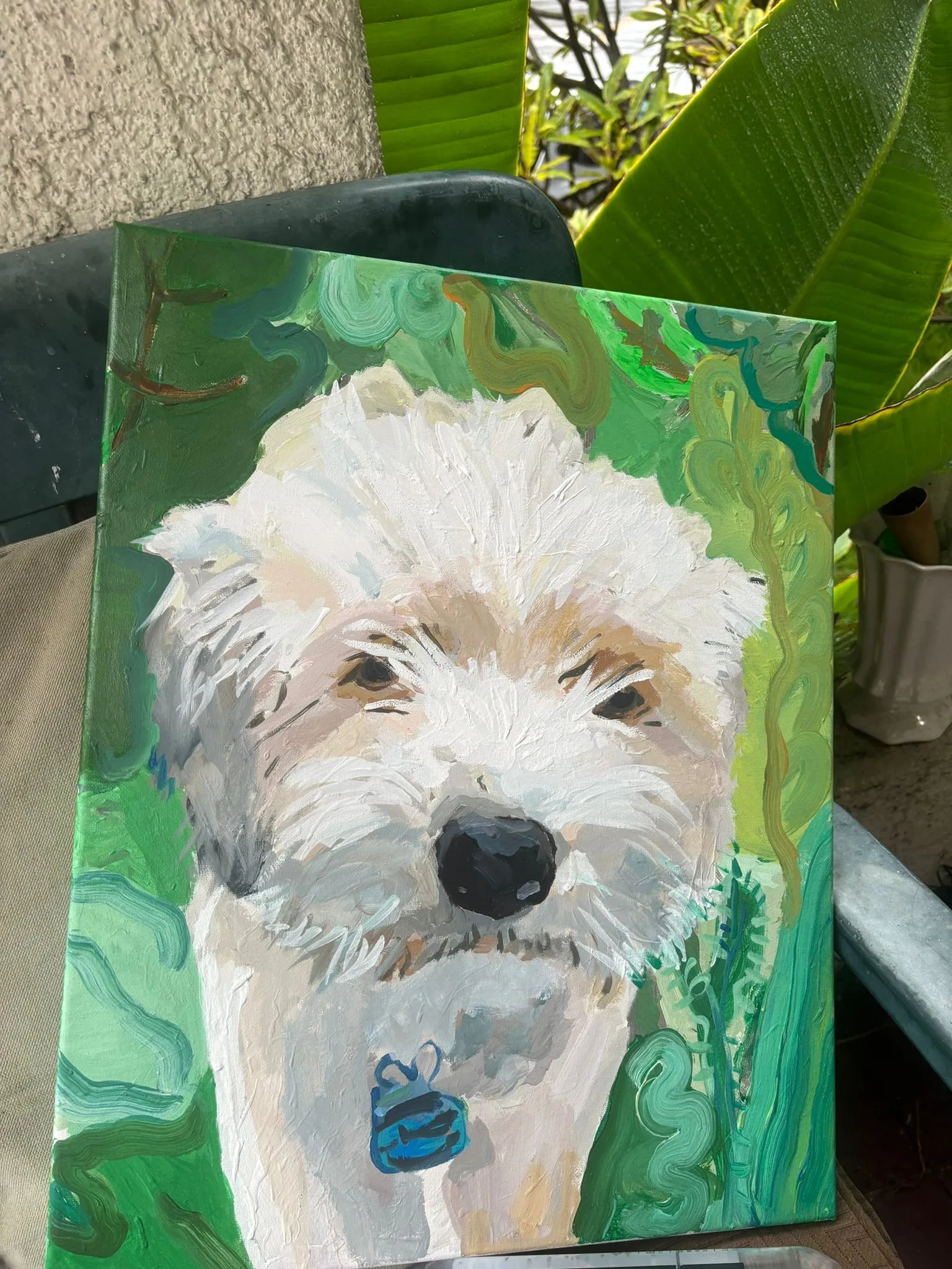 Painted portrait of a white doodle dog on a green background
